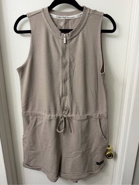Calvin Klein Performance Sleeveless Zip Romper in Taupe Beige